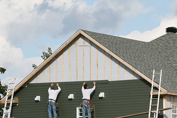 Professional Siding Repair technician working in Wellsville, OH